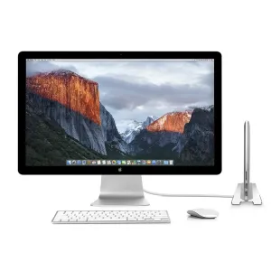 Twelve South BookArc -pystyteline MacBookille, joka pitää suljettua MacBookia desktop-näytön vieressä