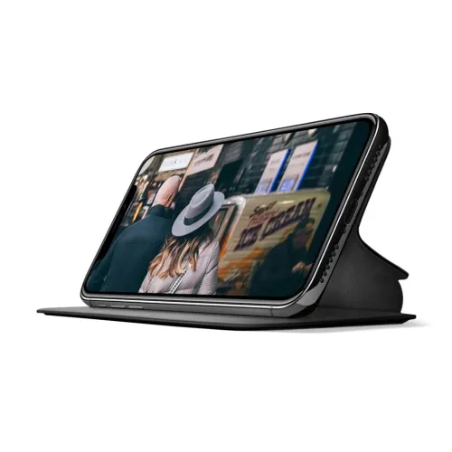 SurfacePad leather case for iPhone X is used as a stand in horizontal position, with lid open, buttons, speaker grille and port.