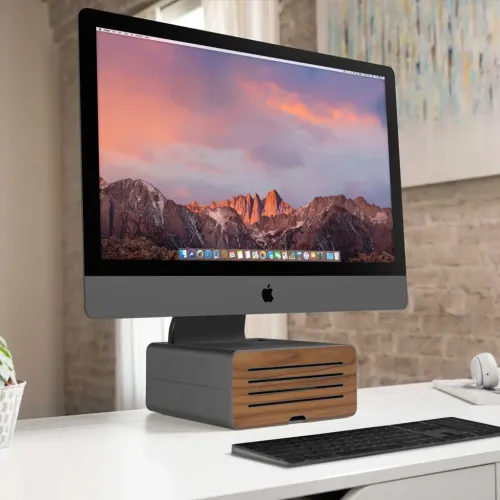 Twelve South HiRise Pro iMac-ställ i gunmetalgrått, som höjer en iMac med dold skrivbordsförvaring.