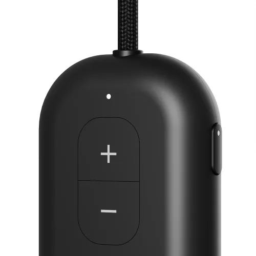 Musta, pyöristetty AirFly Pro 2 -sovitin lähikuvassa, jossa on punottu hihna päällä, LED-valo, etuosa +/- painikkeilla ja sivupainike.