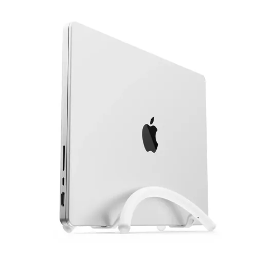 Twelve South BookArc Flex white vertical laptop stand holding a MacBook upright to save desk space